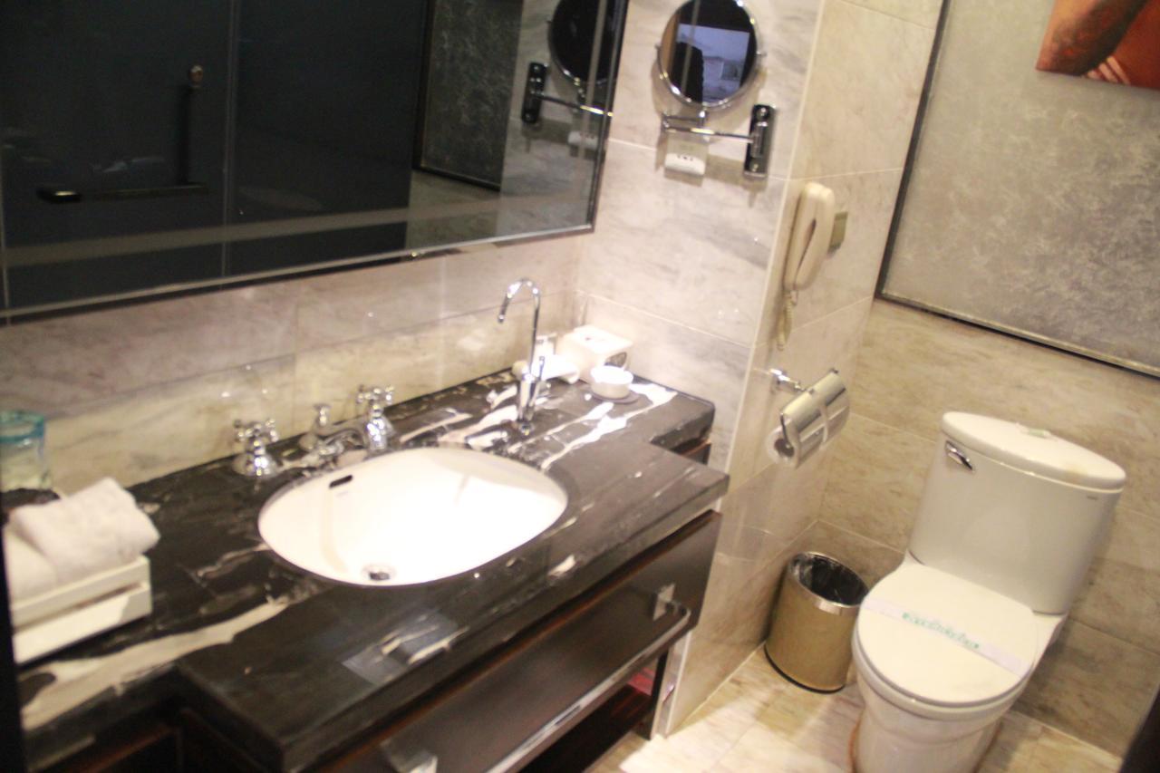 Huangjingang Holiday Hotel Jiexiu Ruang foto