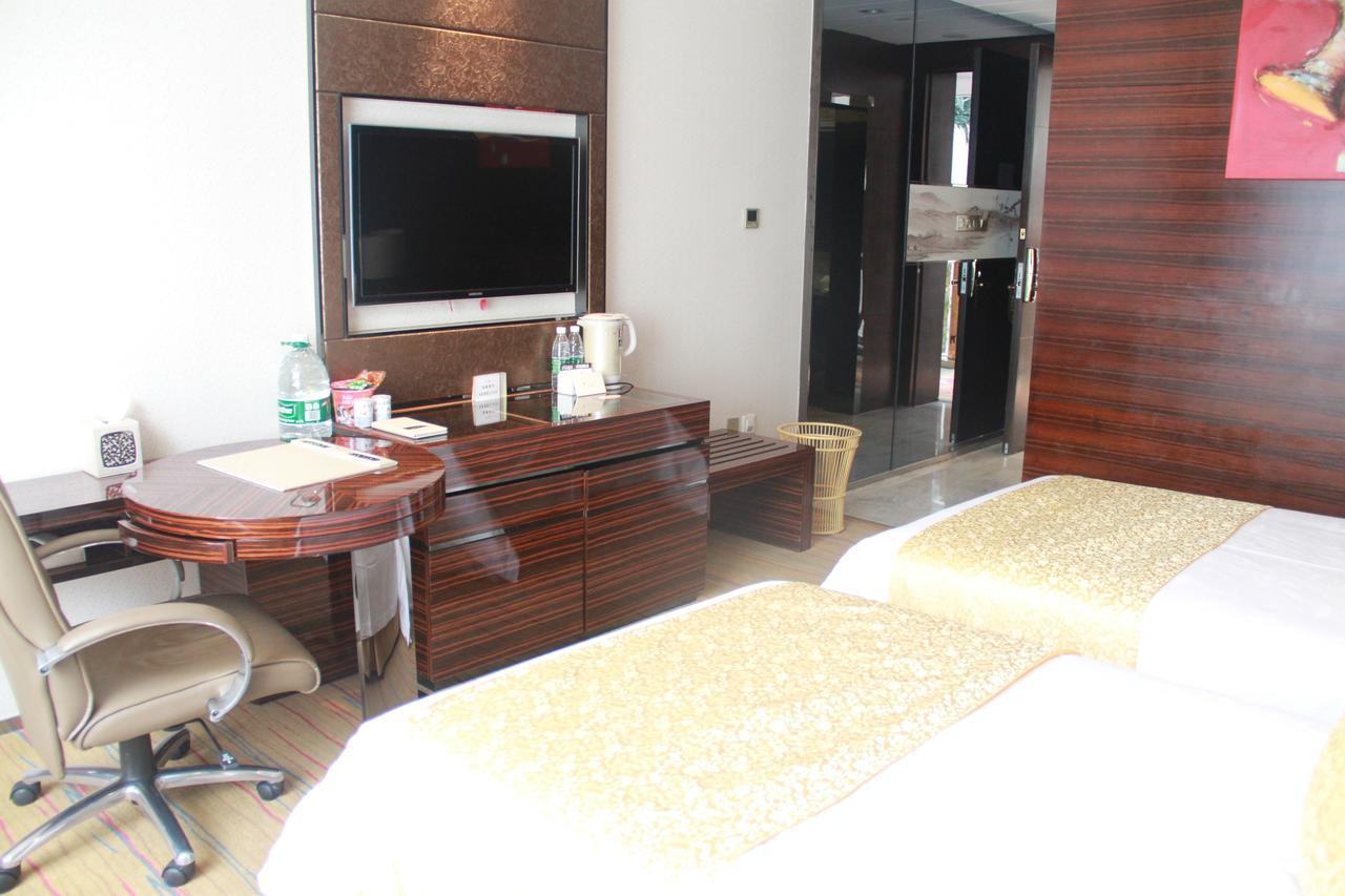 Huangjingang Holiday Hotel Jiexiu Ruang foto